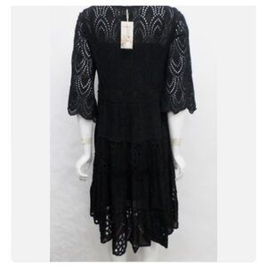 NWT Johnny  Was black dress with slip. Solid with eyelet embroidery. 3/4 sleeves